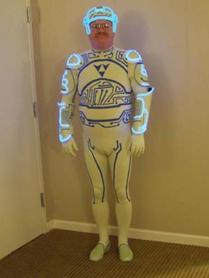 tron 1982 fat weird man with glasses posing in a tron costume